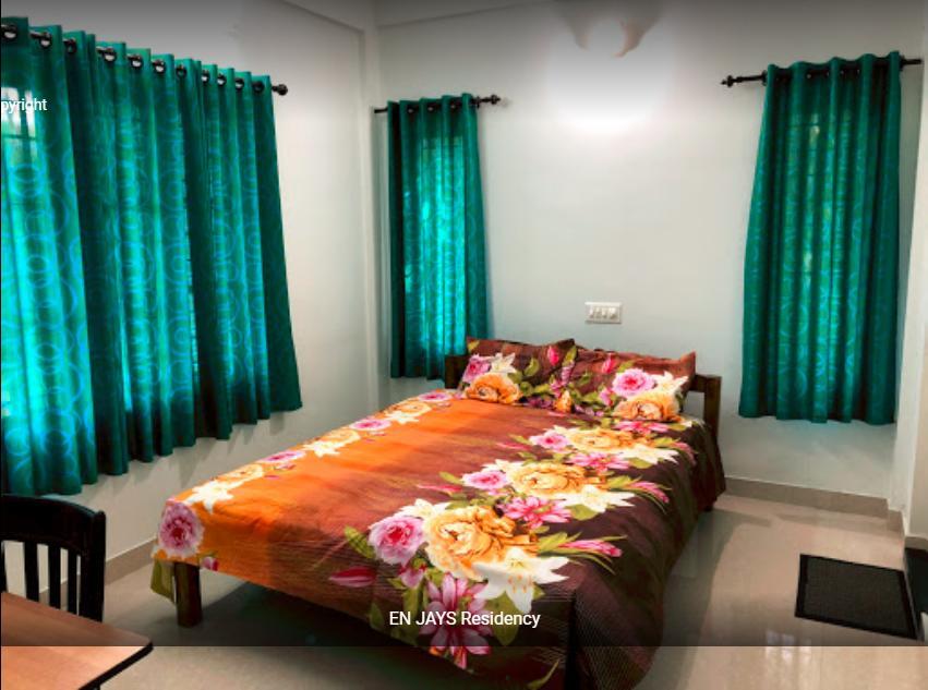 En Jays Residency Apartment Котаям Екстериор снимка